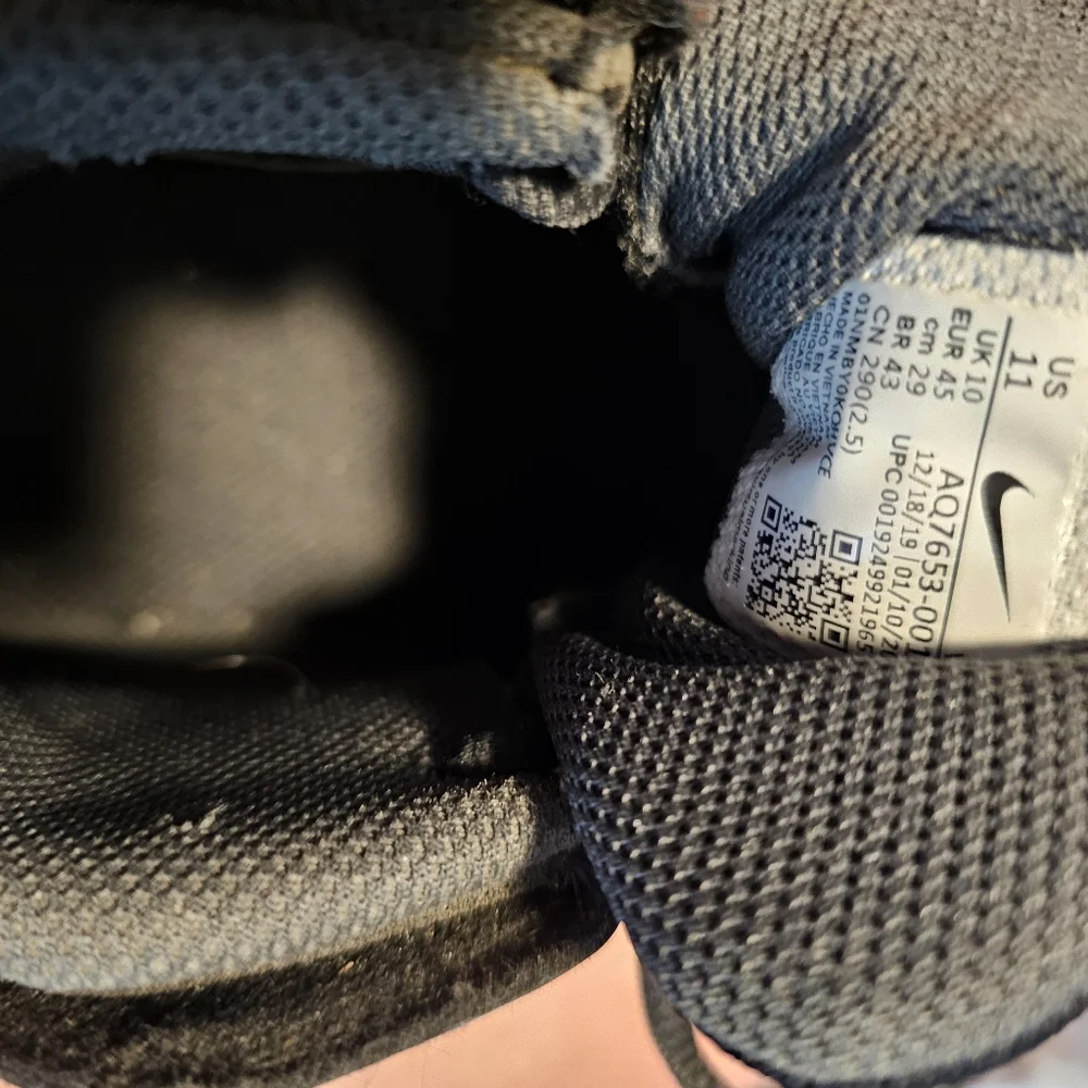 Nike Alpha Fastflex Black and White High-Top Athletic Cleats‎